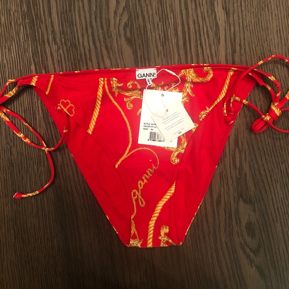 Brand new. Still in packaging with tags. Ganni string bikini bottom, size 14